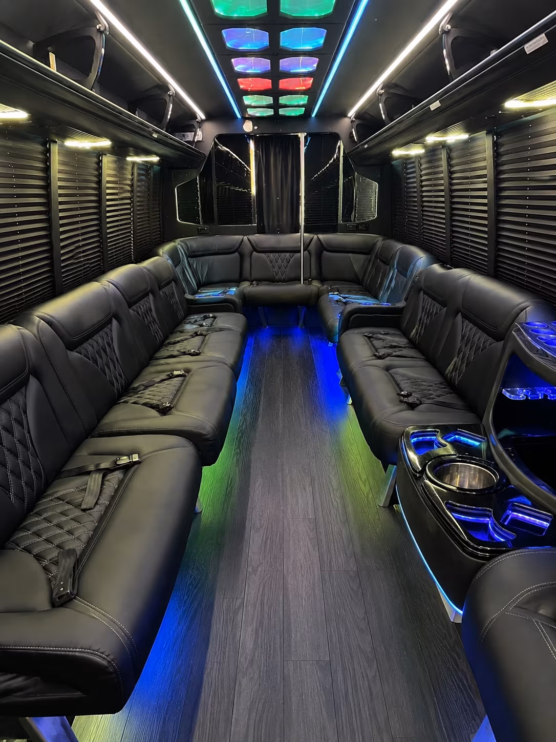 Group beside a Mercedes Sprinter limo in West Covina